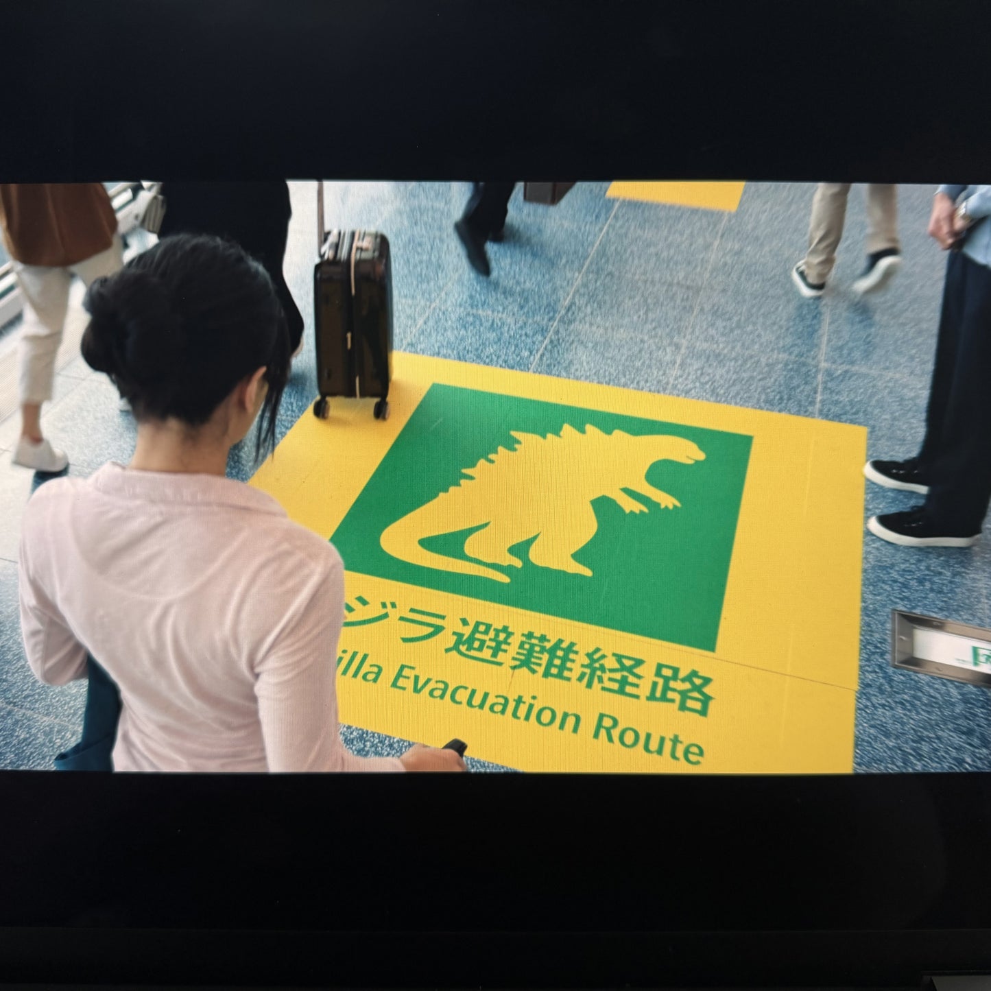 Scene from Monarch Legacy of Monsters in a Tokyo Airport