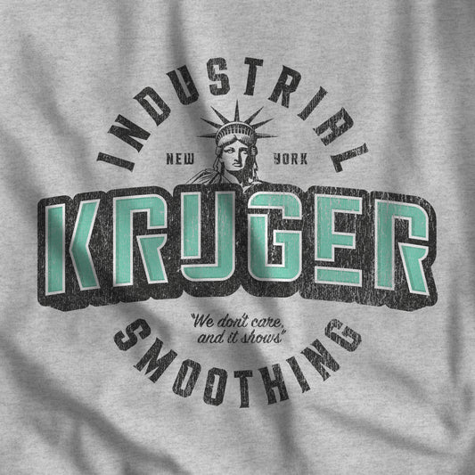 Closeup of heather gray Bella+Canvas t-shirt featuring a Kruger Industrial Smoothing logo graphic inspired by the TV show Seinfeld in a vintage distressed style.