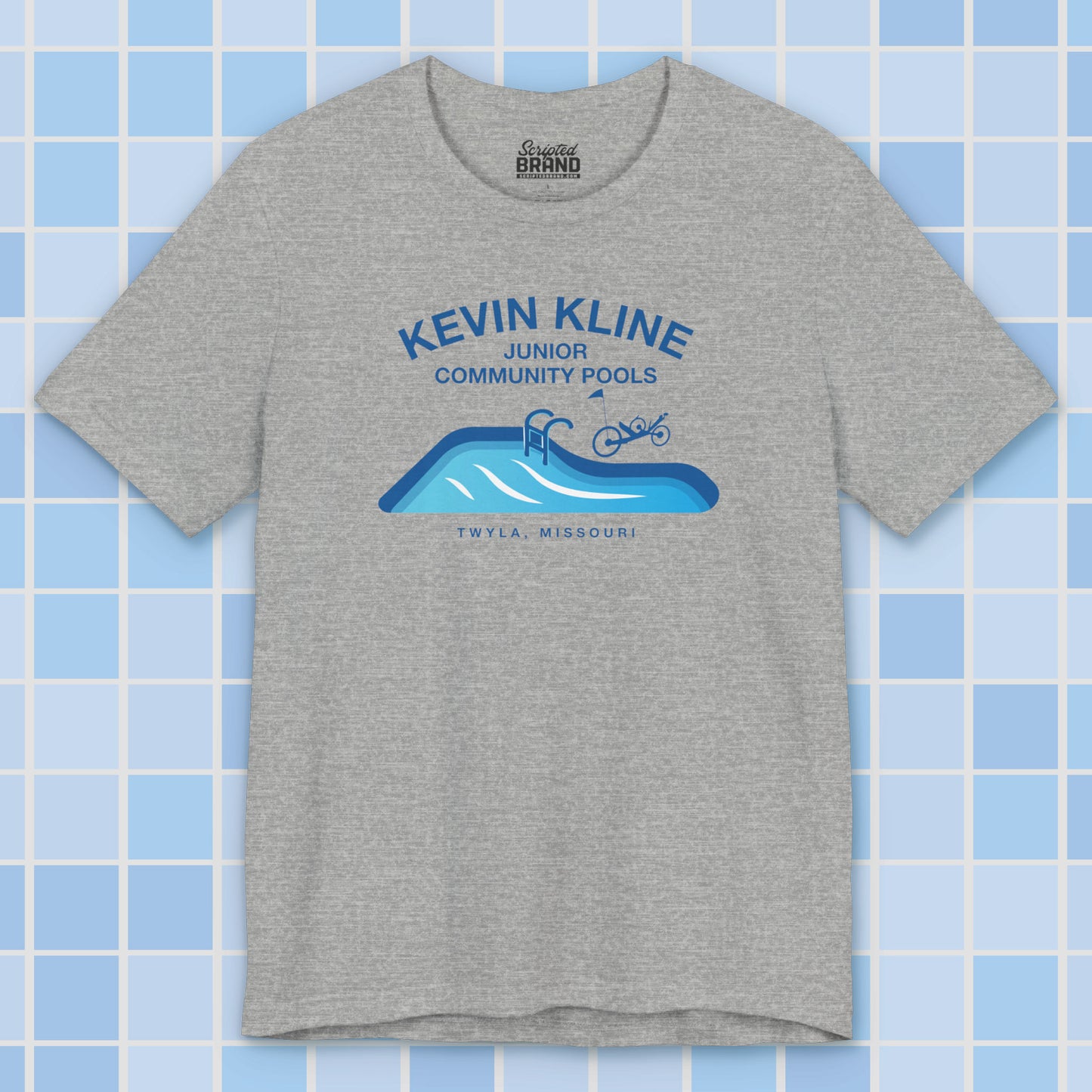 Heather gray DTF St. Louis Kevin Kline Junior Community Pools graphic tee with pool and recumbent trike, Bella+Canvas 3001.