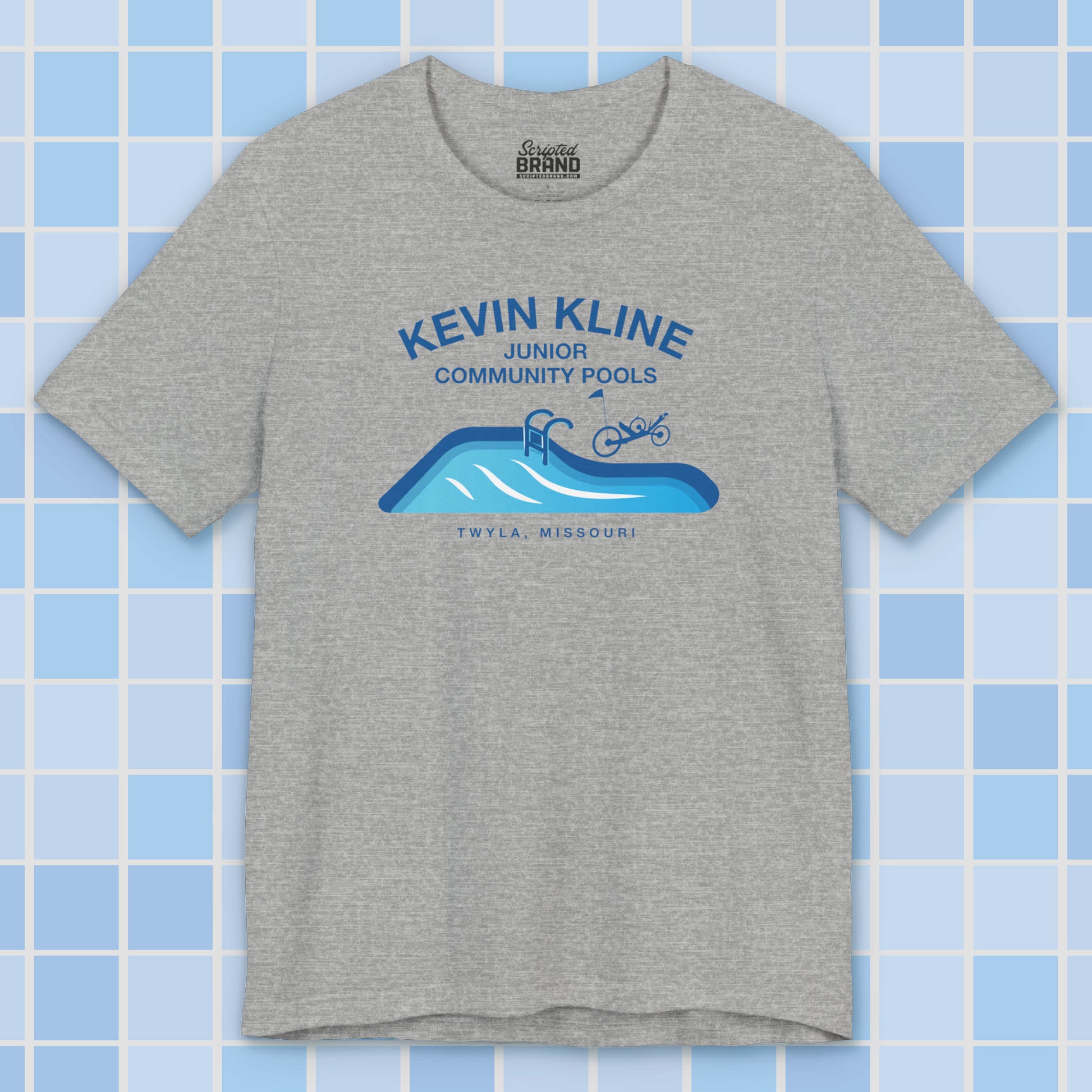 Heather gray DTF St. Louis Kevin Kline Junior Community Pools graphic tee with pool and recumbent trike, Bella+Canvas 3001.
