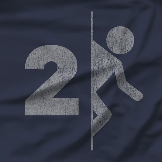 Closeup of Navy tee with vintage distressed Portal 2 partial logo figure diving through a portal, aperture labs