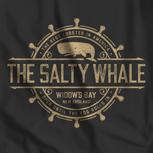 Closeup of black 'The Salty Whale' vintage distressed pub logo t-shirt inspired by Widow's Bay Apple TV series, soft Bella+Canvas cotton tee