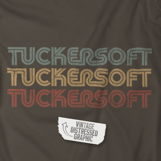 Closeup view of an army colored soft Bella+Canvas 3001 short-sleeve t-shirt tee featuring a logo graphic of the 1980s fictional video game company Tuckersoft inspired by the TV show Black Mirror and the episode Bandersnatch in a vintage distressed style, sold by ScriptedBrand.