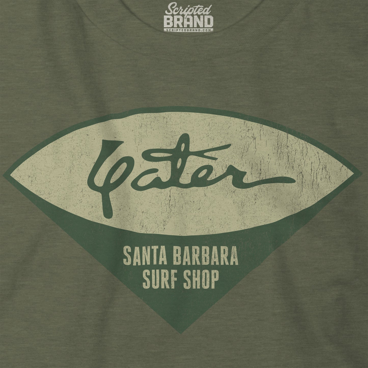 Closeup of Yater Surf Shop vintage distressed t-shirt in heather military green, Bella+Canvas 3001, worn by Robert Duvall in Apocalypse Now.