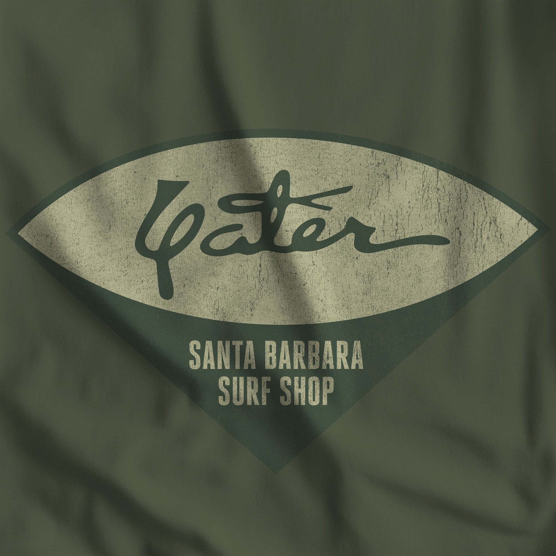 Closeup of Yater Surf Shop vintage distressed long-sleeve t-shirt in military green, Bella+Canvas 3501, worn by Robert Duvall in Apocalypse Now.