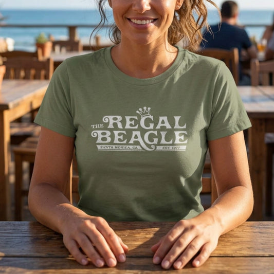 Woman wearing Olive green womens boyfriend tee with vintage distressed Regal Beagle Three's Company logo