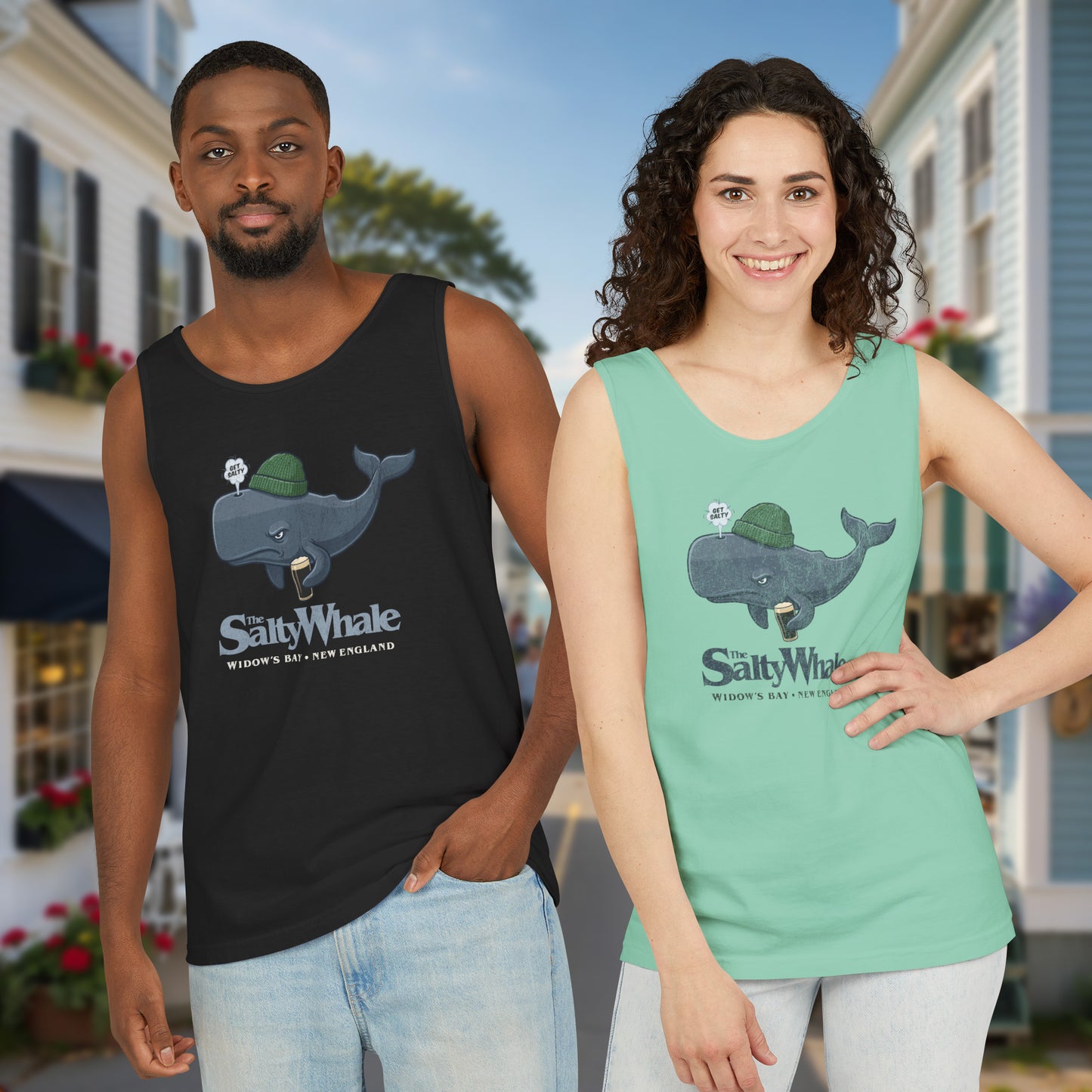 Two people wearing Comfort Colors tanks with the Salty Whale logo from Widow's Bay, a beanie-wearing cartoon whale drinking dark beer