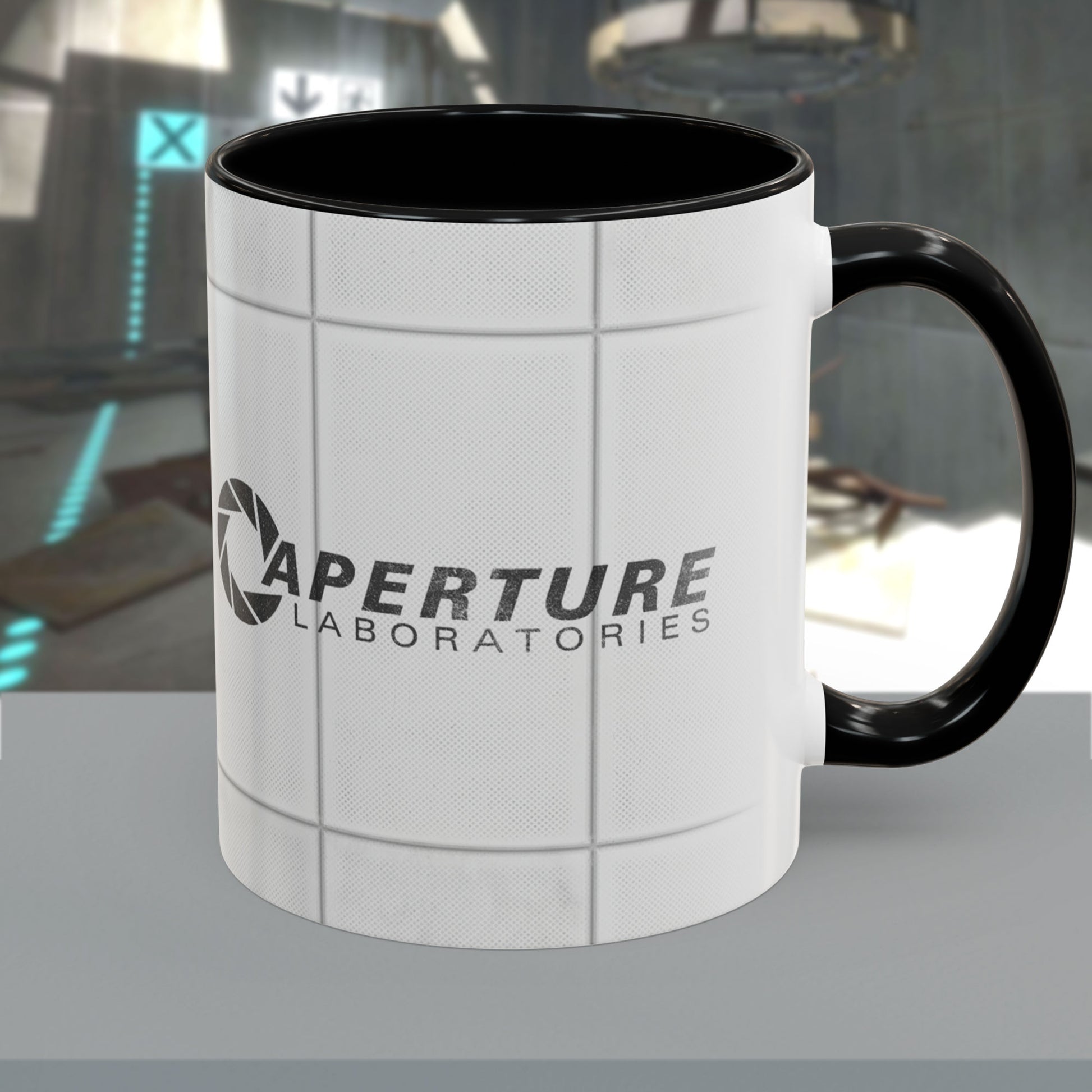 Black accent 11oz mug with Aperture Laboratories logo, Portal test chamber panel wall wrap, logo printed both sides, on a table.