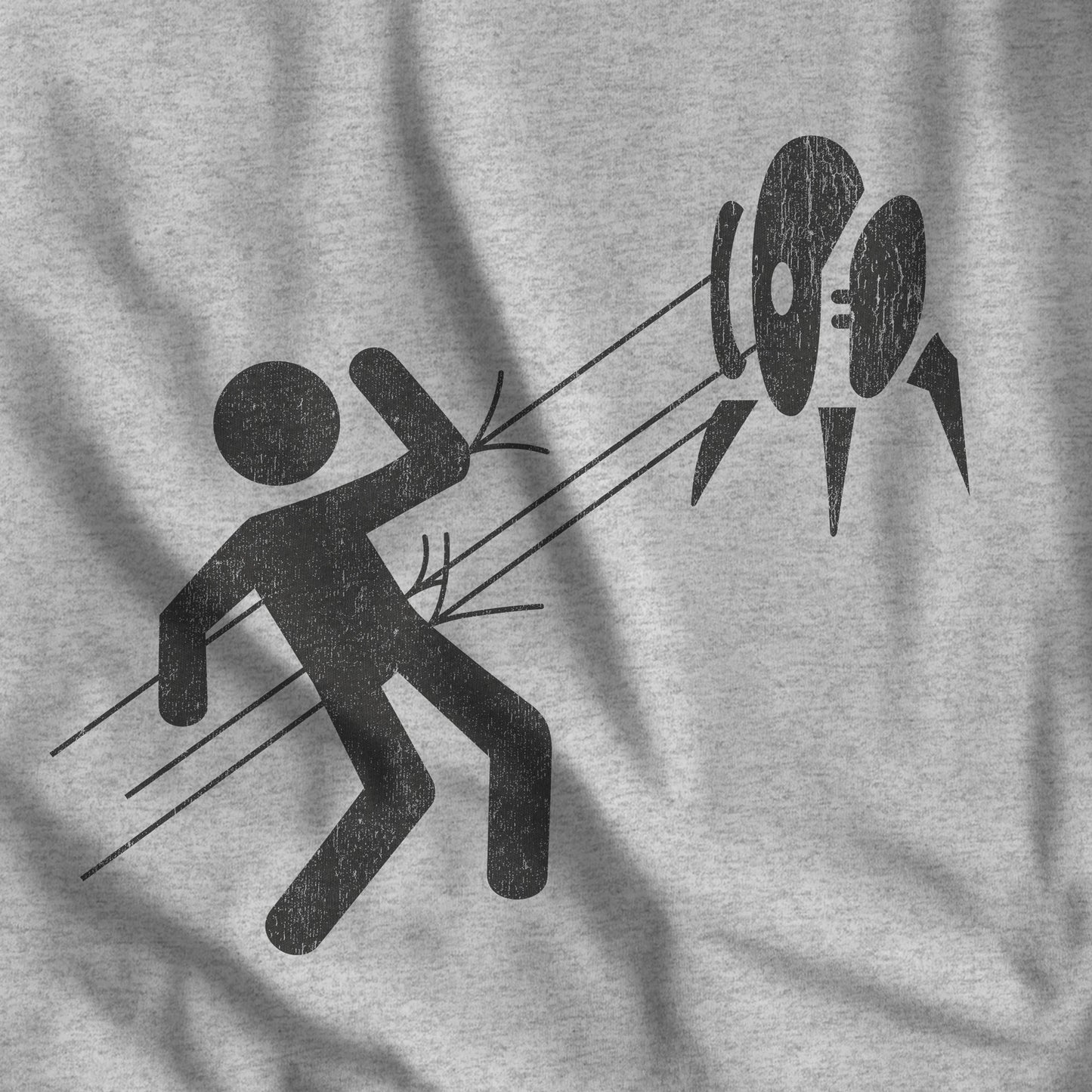 Closeup view of Heather Gray Aperture Science Turret warning icon t-shirt on Bella+Canvas 3001, vintage distressed print, Portal and Portal 2 fan tee.