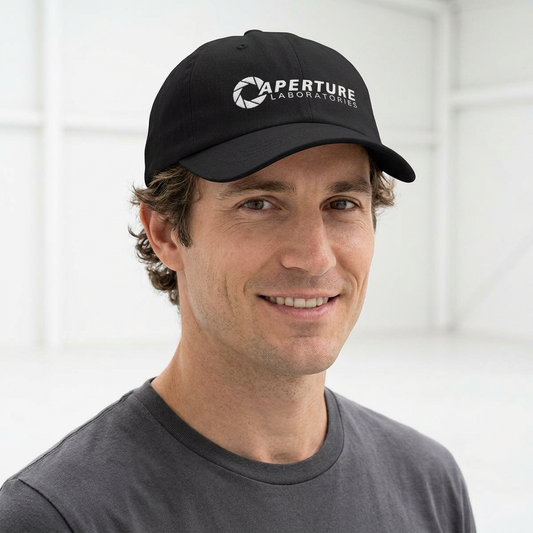 Person wearing a black Aperture Laboratories embroidered logo dad cap inspired by Portal video games, 100% cotton baseball hat