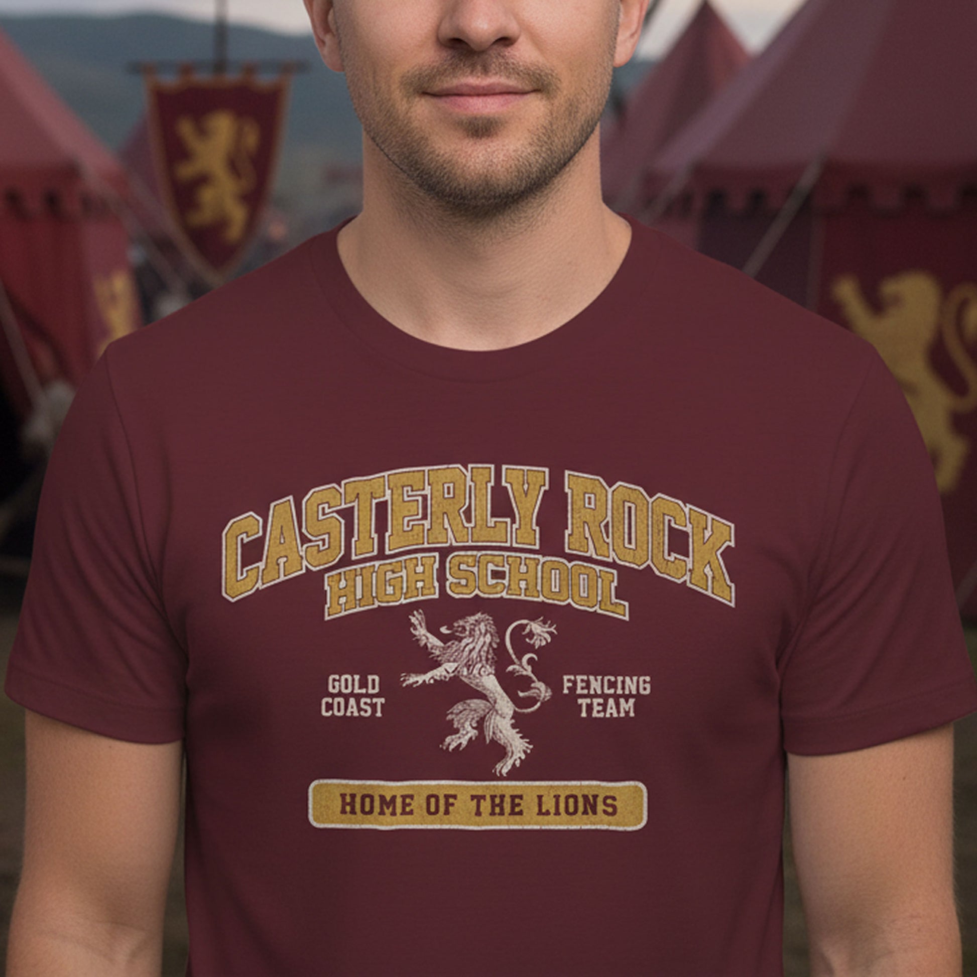 Person wearing maroon Casterly Rock High School t-shirt with vintage lion graphic inspired by Game of Thrones.