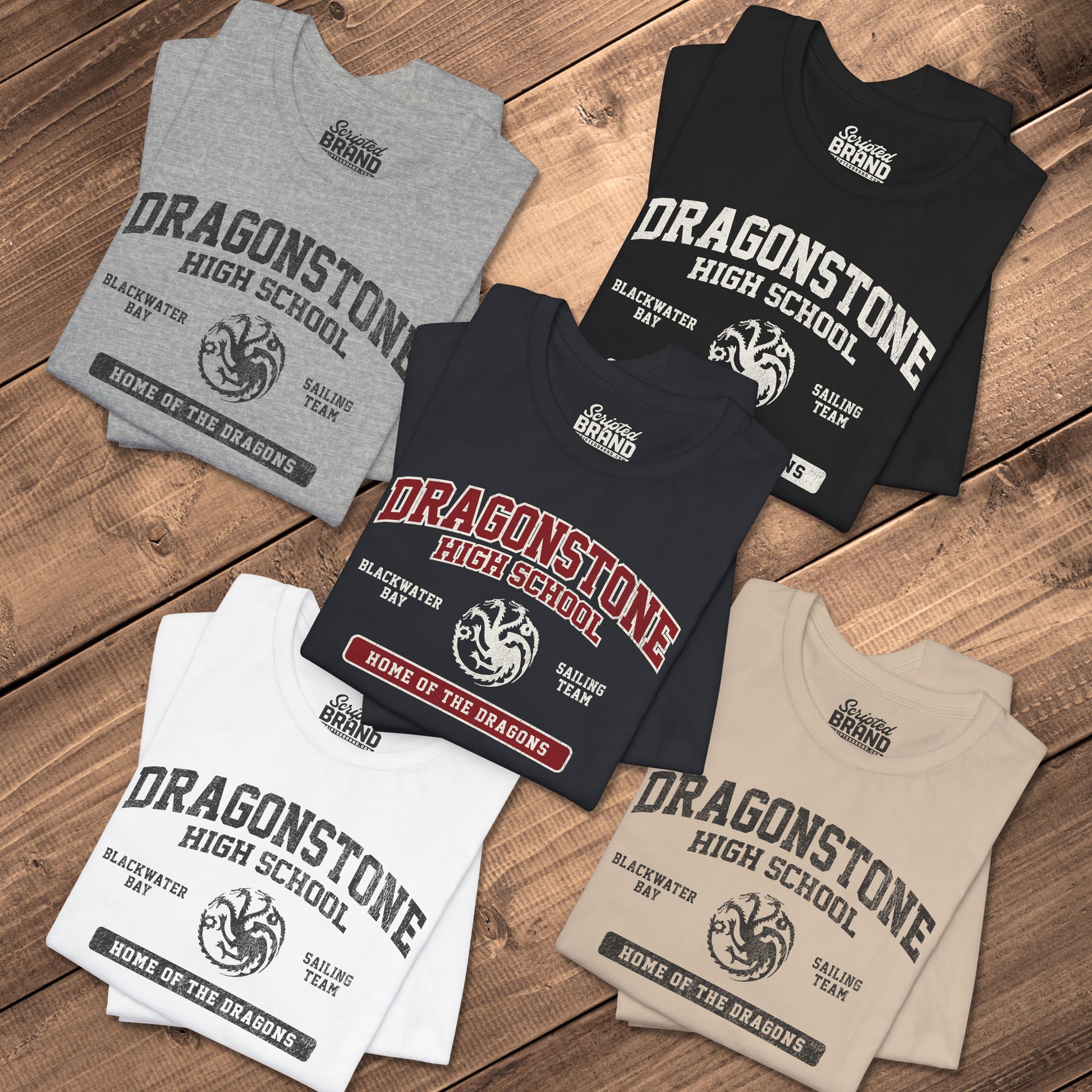 Five folded Dragonstone High School t-shirts with distressed three-headed dragon graphic inspired by Game of Thrones and the Targaryens.