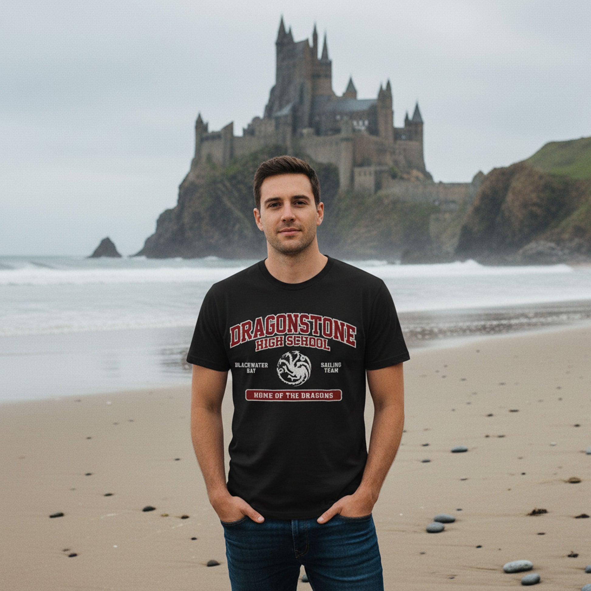 Person on a beach wearing black Dragonstone High School t-shirt with distressed three-headed dragon graphic inspired by Game of Thrones and the Targaryens.