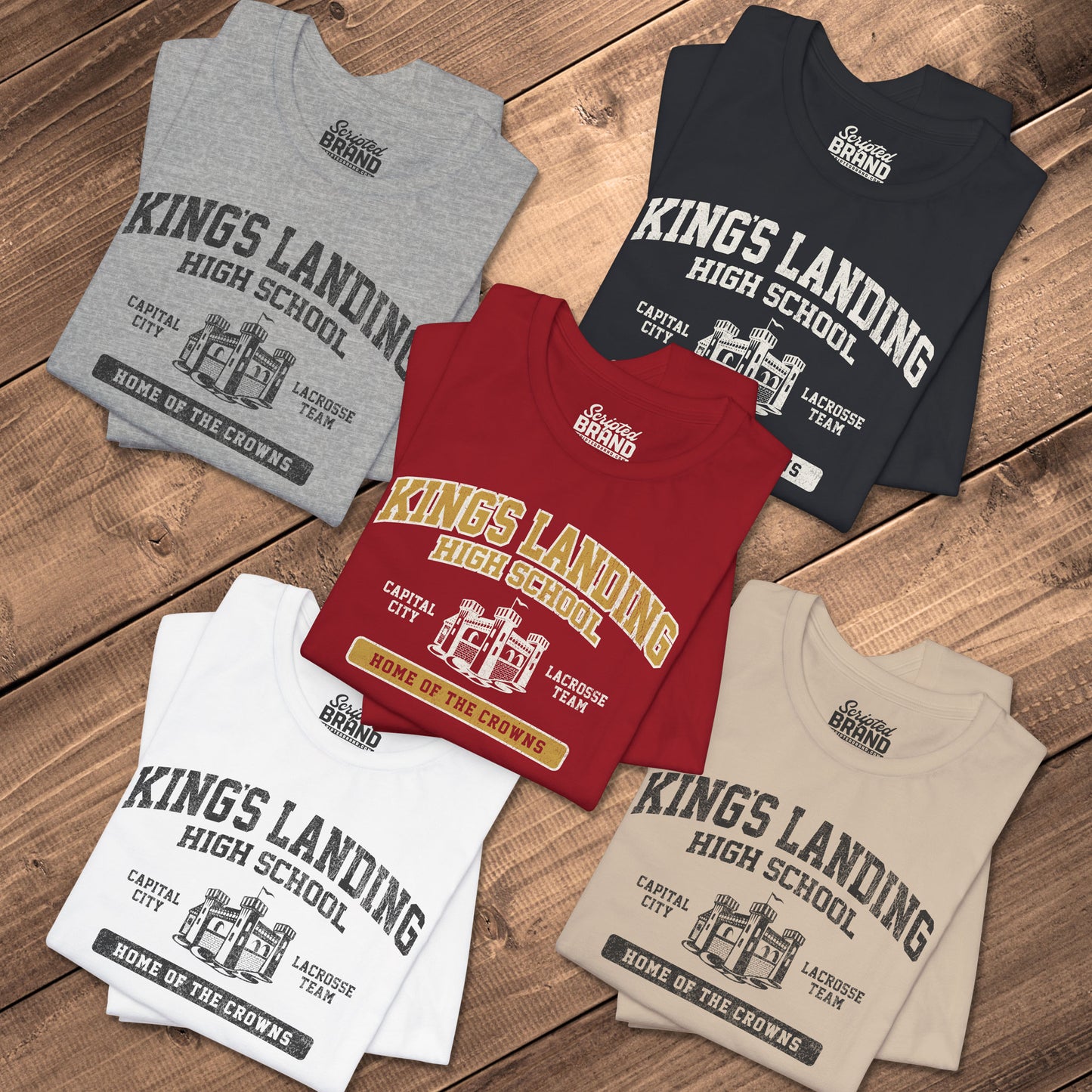 Five folded King's Landing High School t-shirt with vintage castle graphic inspired by Game of Thrones.