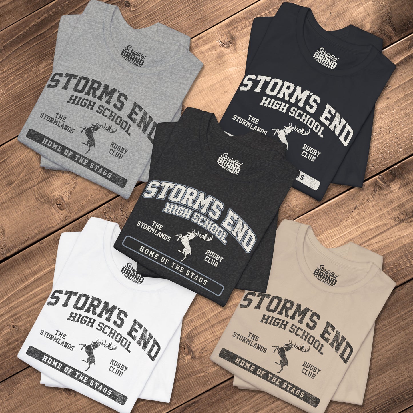 Five folded Storm's End High School t-shirt with vintage deer graphic inspired by Game of Thrones and House Baratheon.