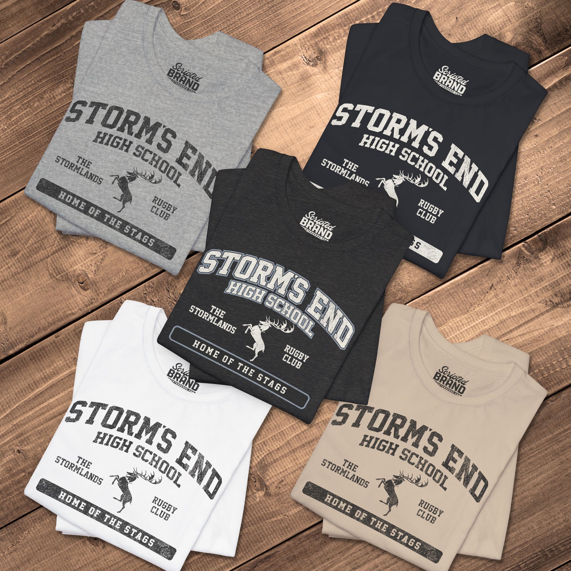 Five folded Storm's End High School t-shirt with vintage deer graphic inspired by Game of Thrones and House Baratheon.