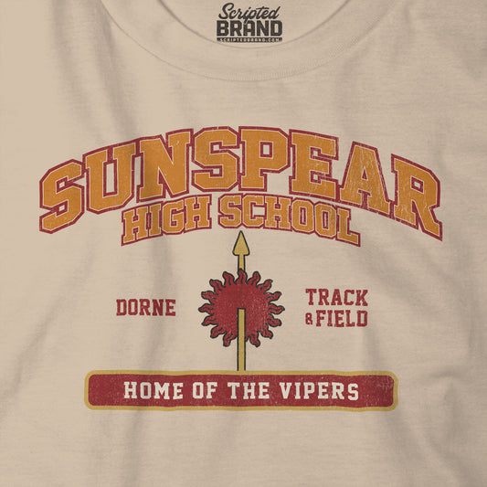 Closeup view of tan Sunspear High School t-shirt with distressed dorne sun graphic inspired by Game of Thrones.
