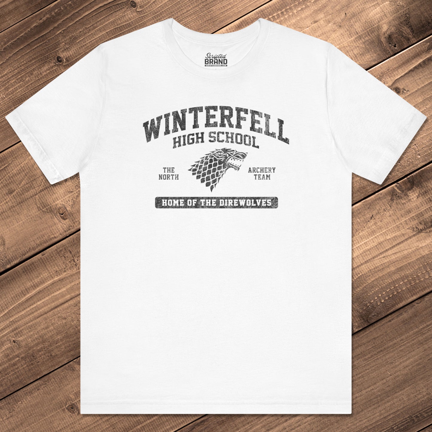 Front view of White Winterfell High School t-shirt with vintage direwolf graphic inspired by Game of Thrones.