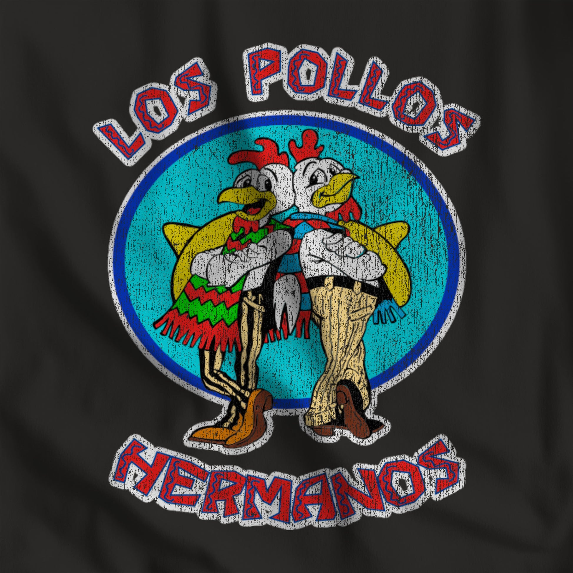 Closeup of black pullover hoodie with vintage distressed Los Pollos Hermanos logo from Breaking Bad on chest.
