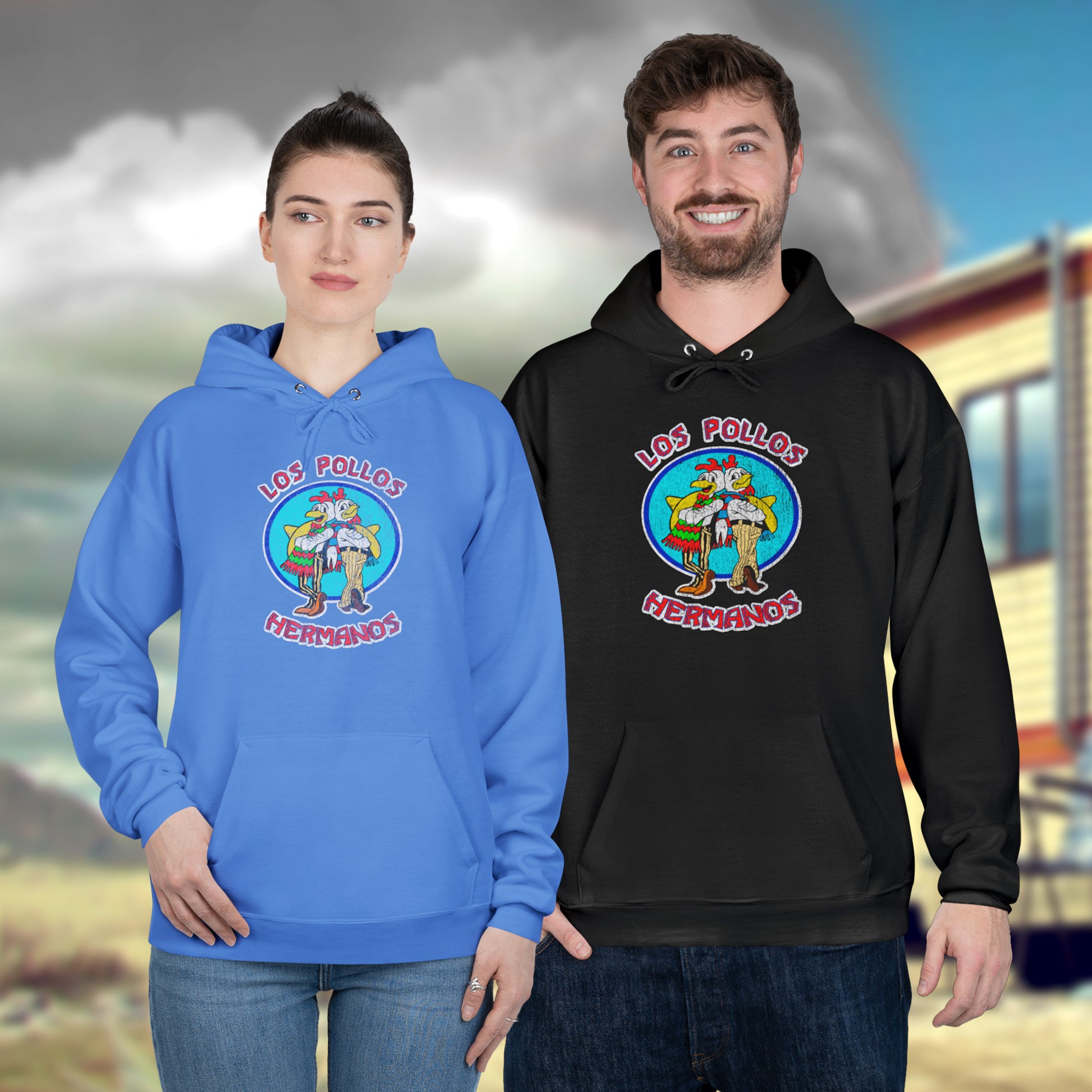 Two people wearing pullover hoodies with vintage distressed Los Pollos Hermanos logo from Breaking Bad on chest.
