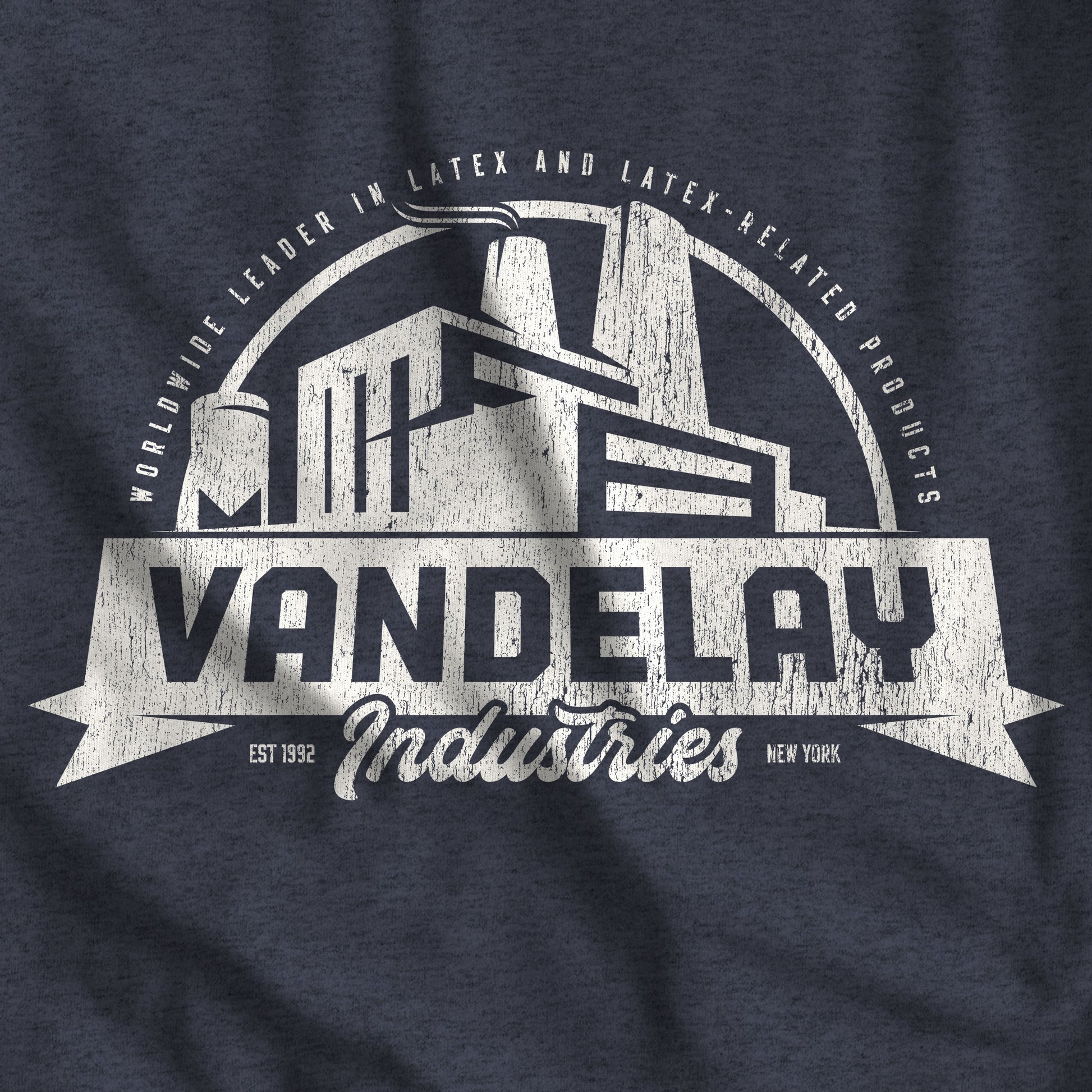 Closeup of Heather Navy Blue Bella+Canvas 3001 t-shirt with a Vandelay Industries logo that George Costanza made up in the TV Show Seinfeld.