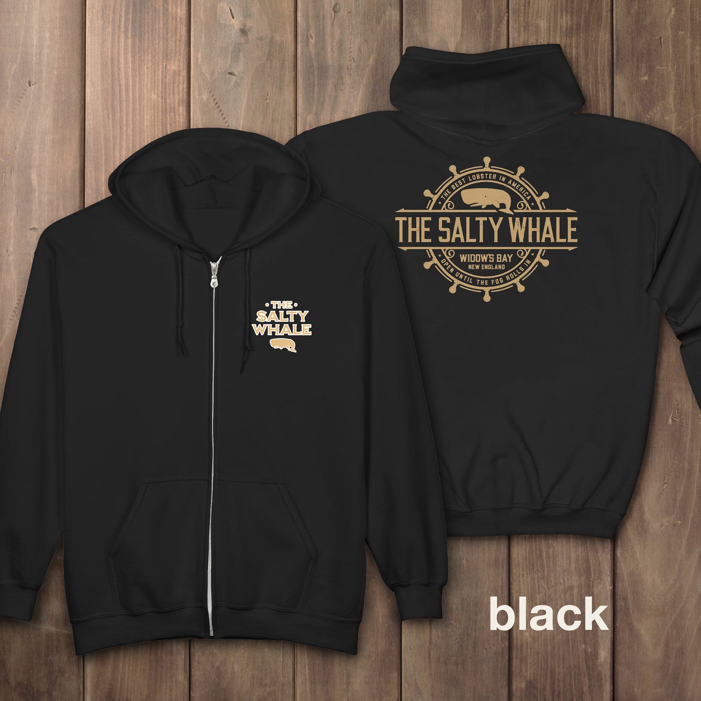 Black Gildan full-zip hoodie with Widow's Bay Salty Whale logo on front and gold distressed maritime crest across the back