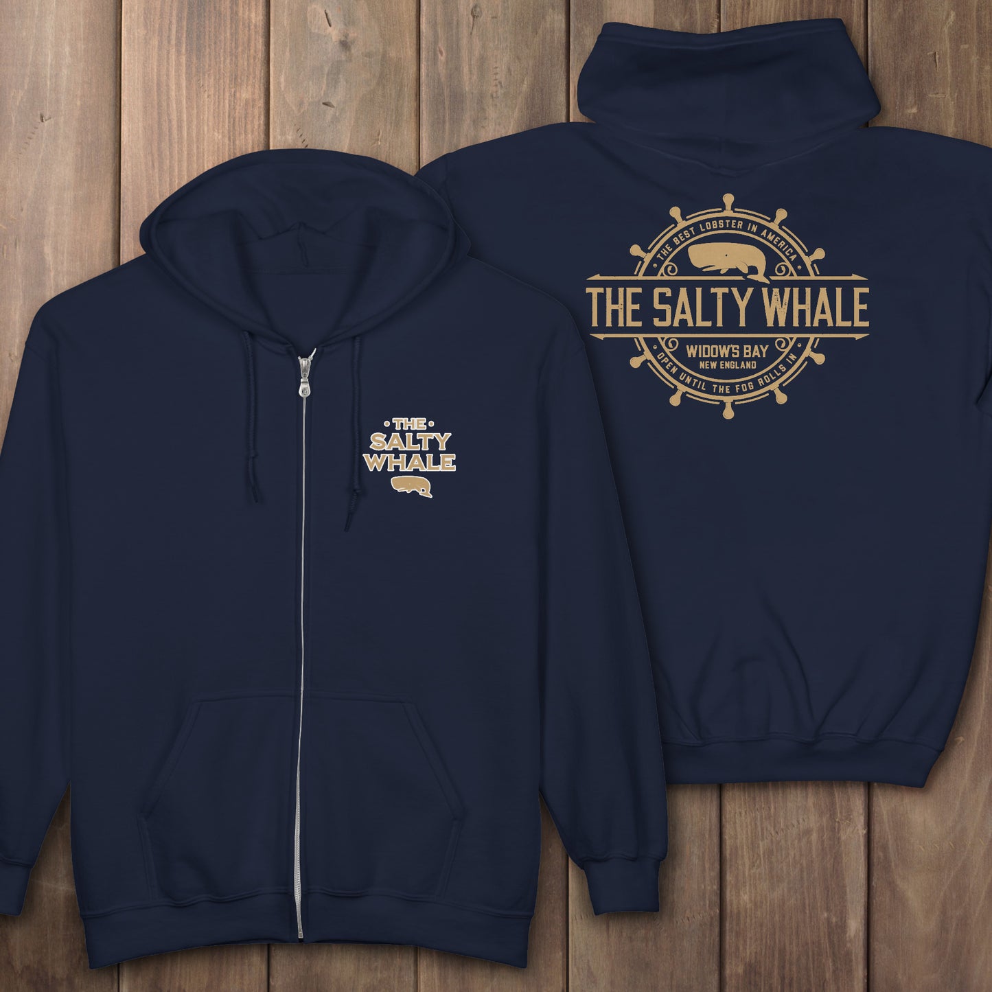 Gildan full-zip hoodie with Widow's Bay Salty Whale logo on front and gold distressed maritime crest across the back