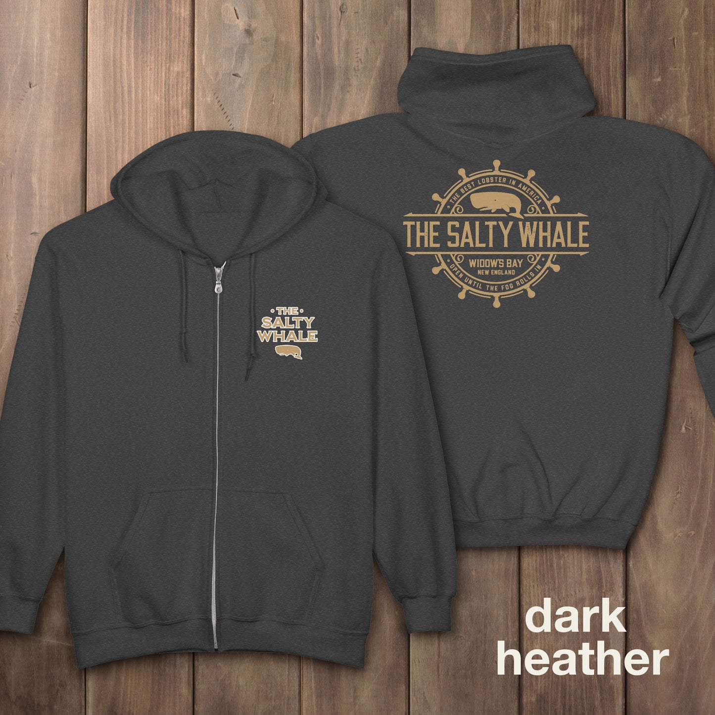 Dark heather gray Gildan full-zip hoodie with Widow's Bay Salty Whale logo on front and gold distressed maritime crest across the back