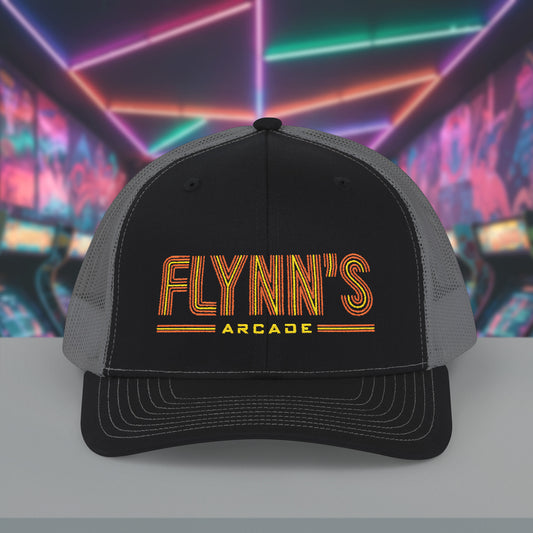 Black and charcoal Richardson 112 snapback trucker baseball cap with 'Flynn’s Arcade' neon logo inspired by TRON.