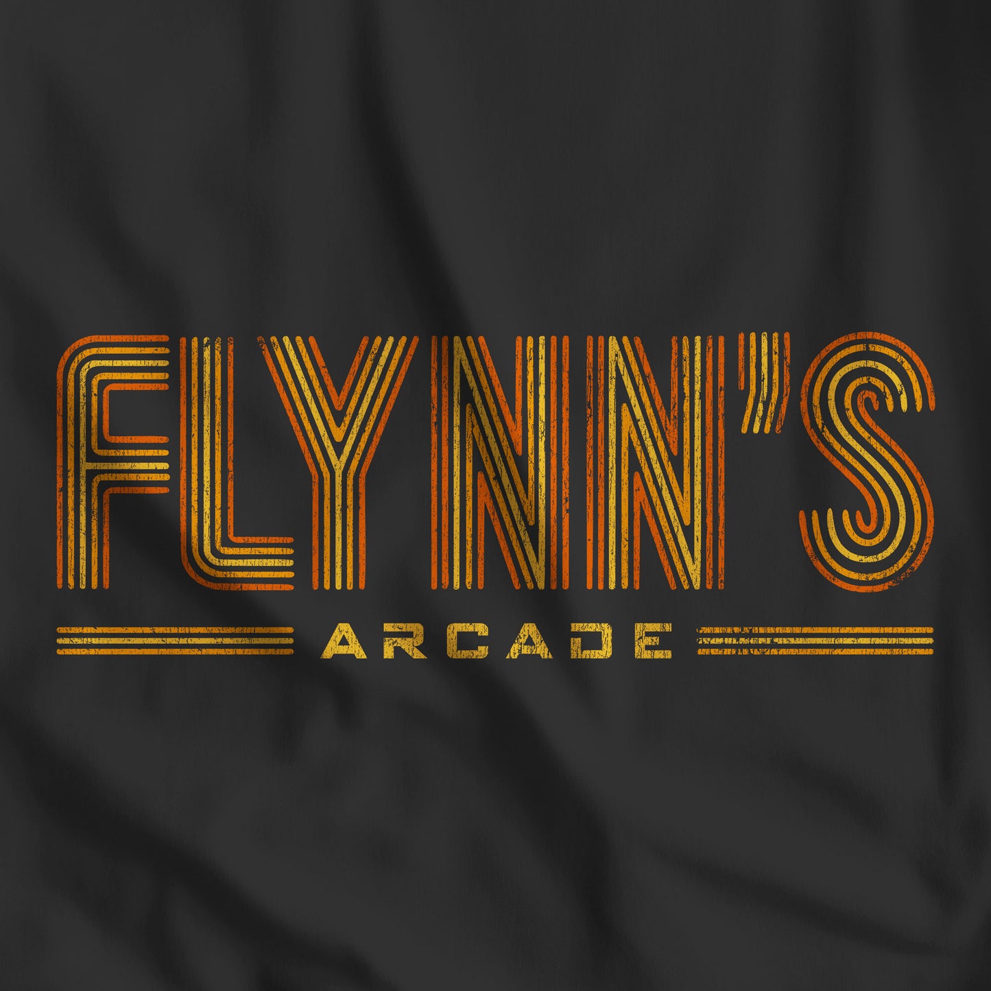 Closeup of black tee with vintage distressed 'Flynn’s Arcade' neon sign logo inspired by TRON, unisex fit t-shirt