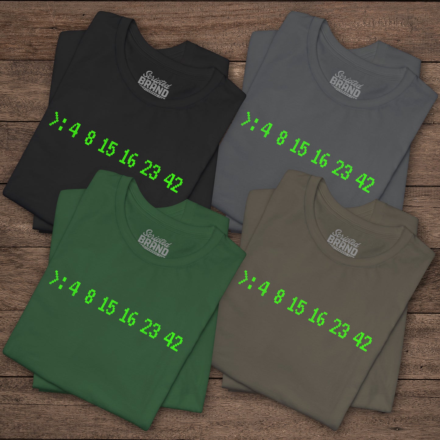 Four folded Bella+Canvas 3001 t-shirts with terminal green LOST Dharma Initiative hatch numbers 4 8 15 16 23 42