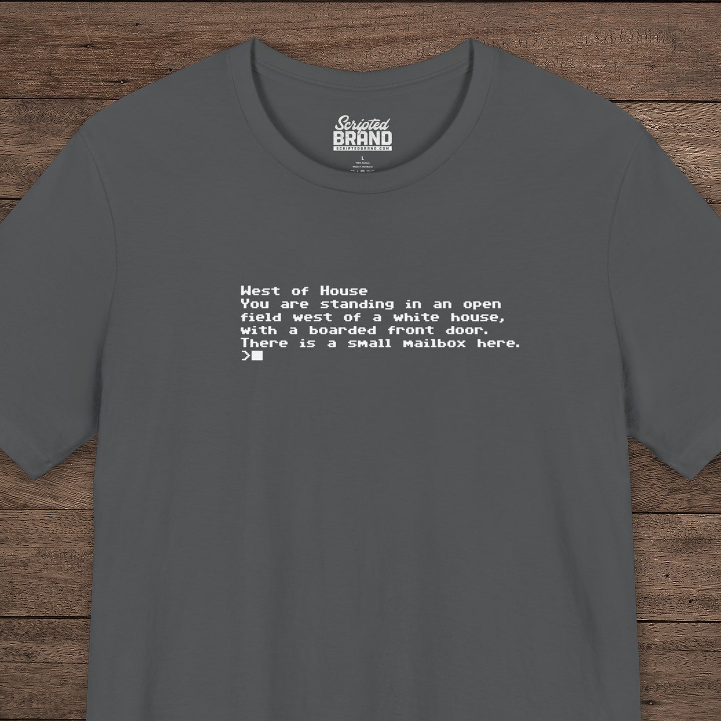 Gray Bella+Canvas 3001 Zork “West of House” text adventure quote t-shirt with terminal-style printed text