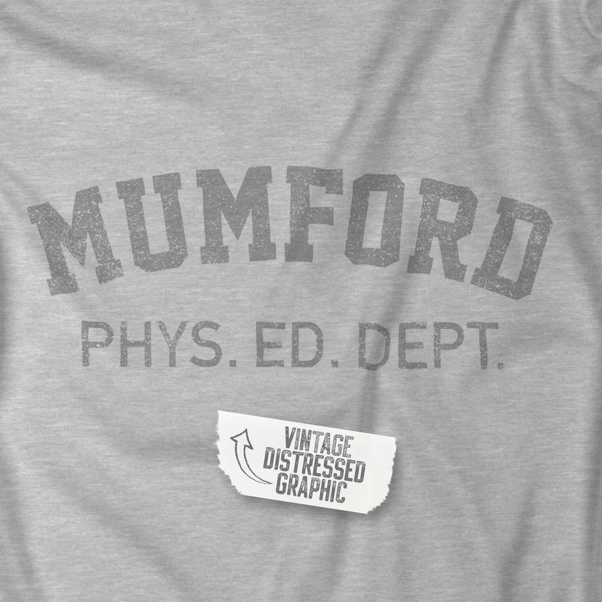 Closeup of an Athletic Heather Grey Soft Bella+Canvas 3001 short-sleeve t-shirt gym tee featuring the Mumford Phys Ed logo graphic that Eddie Murphy wore as Axel Foley in the movie Beverly Hills Cop in a vintage distressed style, sold by ScriptedBrand.