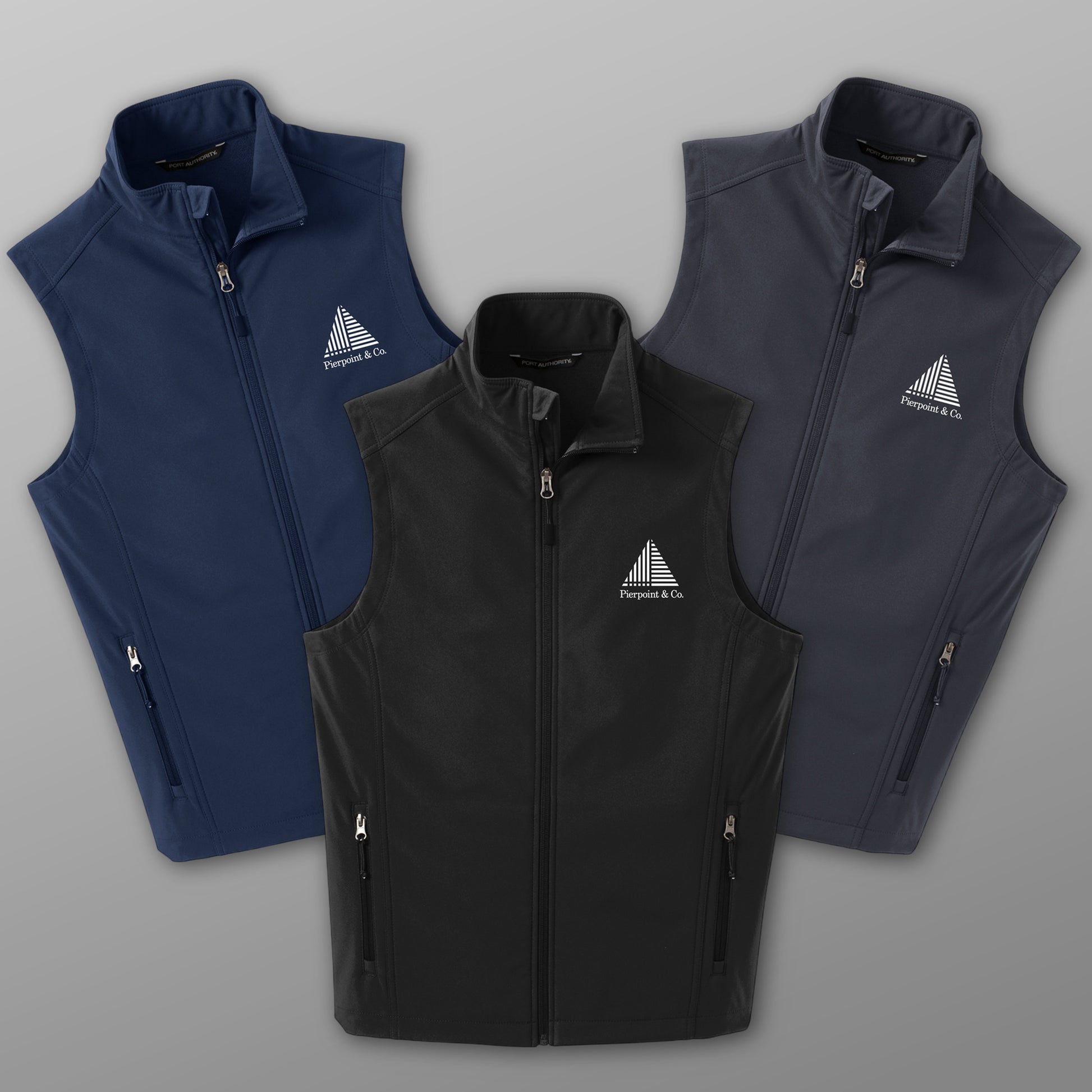Group of three Port Authority J325 soft shell vests with white Pierpoint & Co logo embroidery, inspired by Industry.