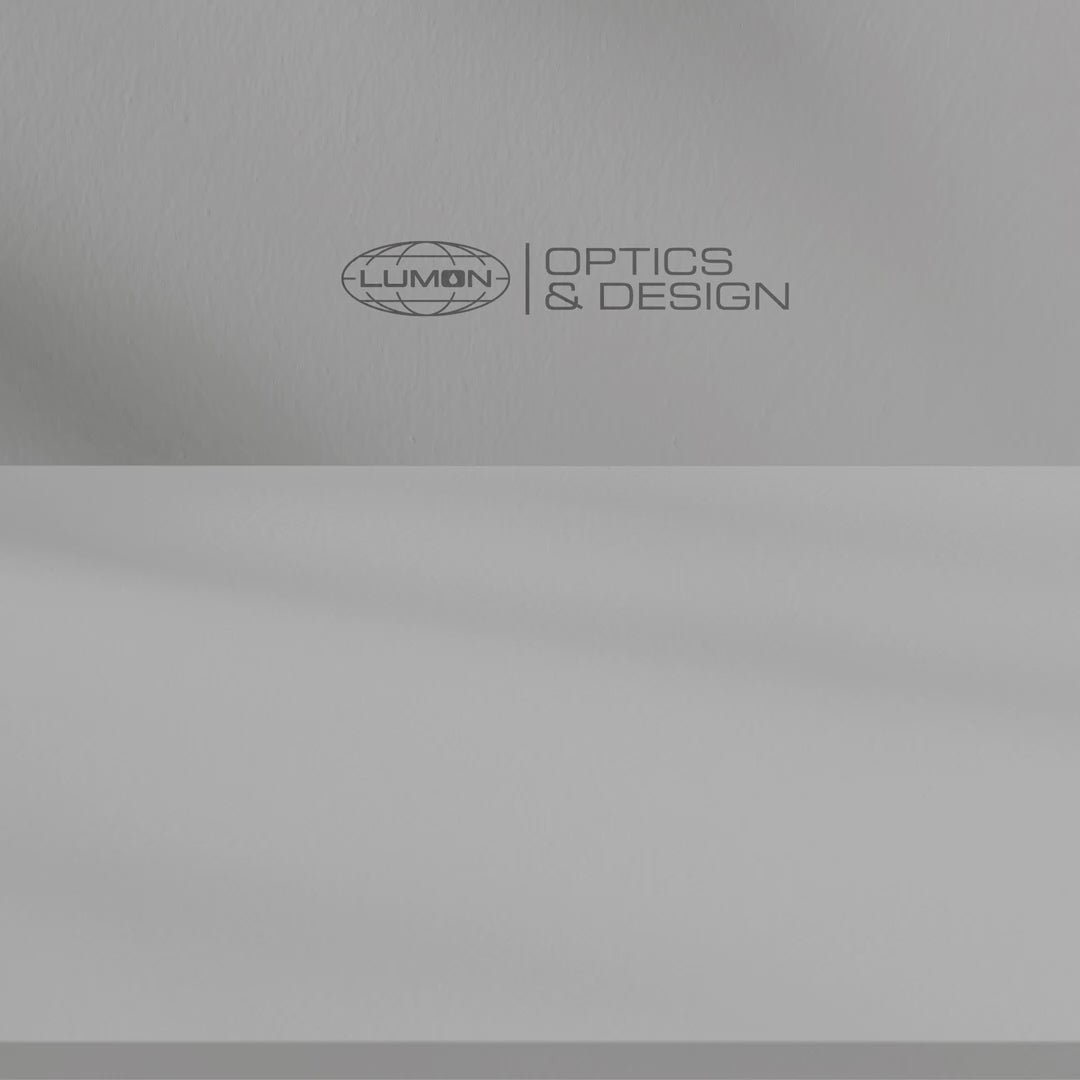 Video of AS Colour cuff beanie with embroidered blue Lumon Industries logo from Severance, fisherman-style ribbed knit hat.