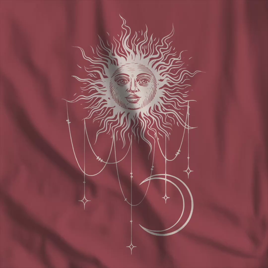 Video of youth tee with Patricia boho celestial sun, stars, and crescent moon design from Widow's Bay