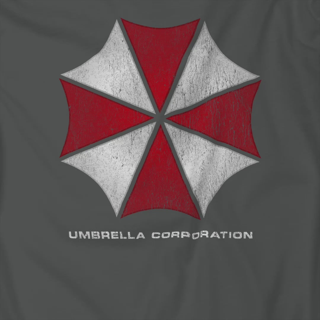 Video of t-shirts featuring the Umbrella Corp logo from the video game and movie franchise Resident Evil in a vintage distressed style.