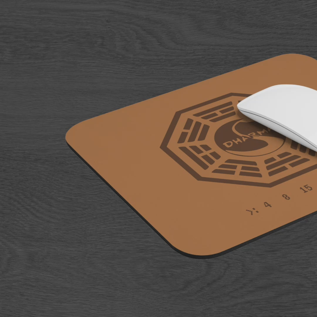 Video of tan 9x8 mouse pad with Dharma Initiative Swan Station logo and hatch numbers from TV show Lost, on a desk
