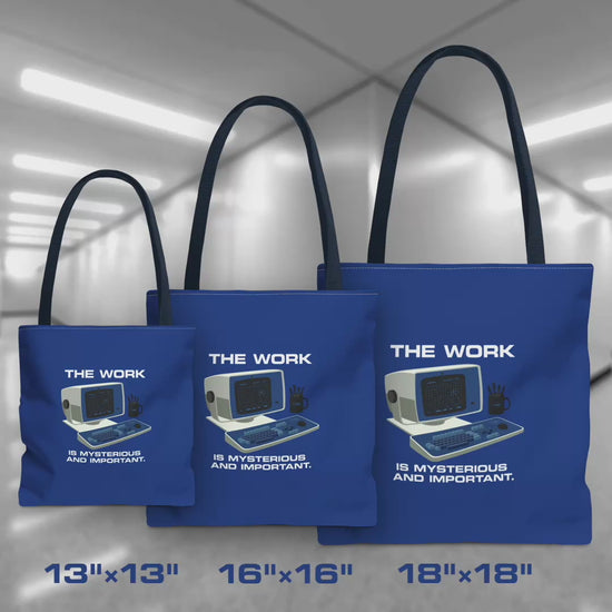 Video of Blue Tote Bags featuring the retro computer workstation from the Apple TV show Severance, and includes the text The Work is Mysterious and Important. Graphic is designed and illustrated by ScriptedBrand, and is available in 3 sizes.