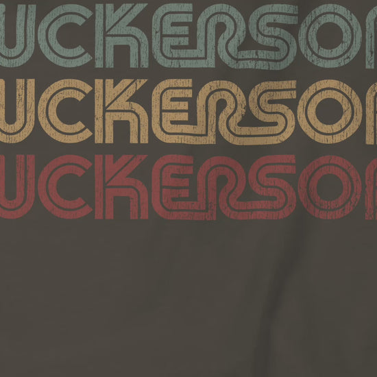 Video closeup of soft Bella+Canvas 3001 short-sleeve t-shirts and tees featuring a logo graphic of the 1980s fictional video game company Tuckersoft inspired by the TV show Black Mirror and the episode Bandersnatch in a vintage distressed style, sold by ScriptedBrand.