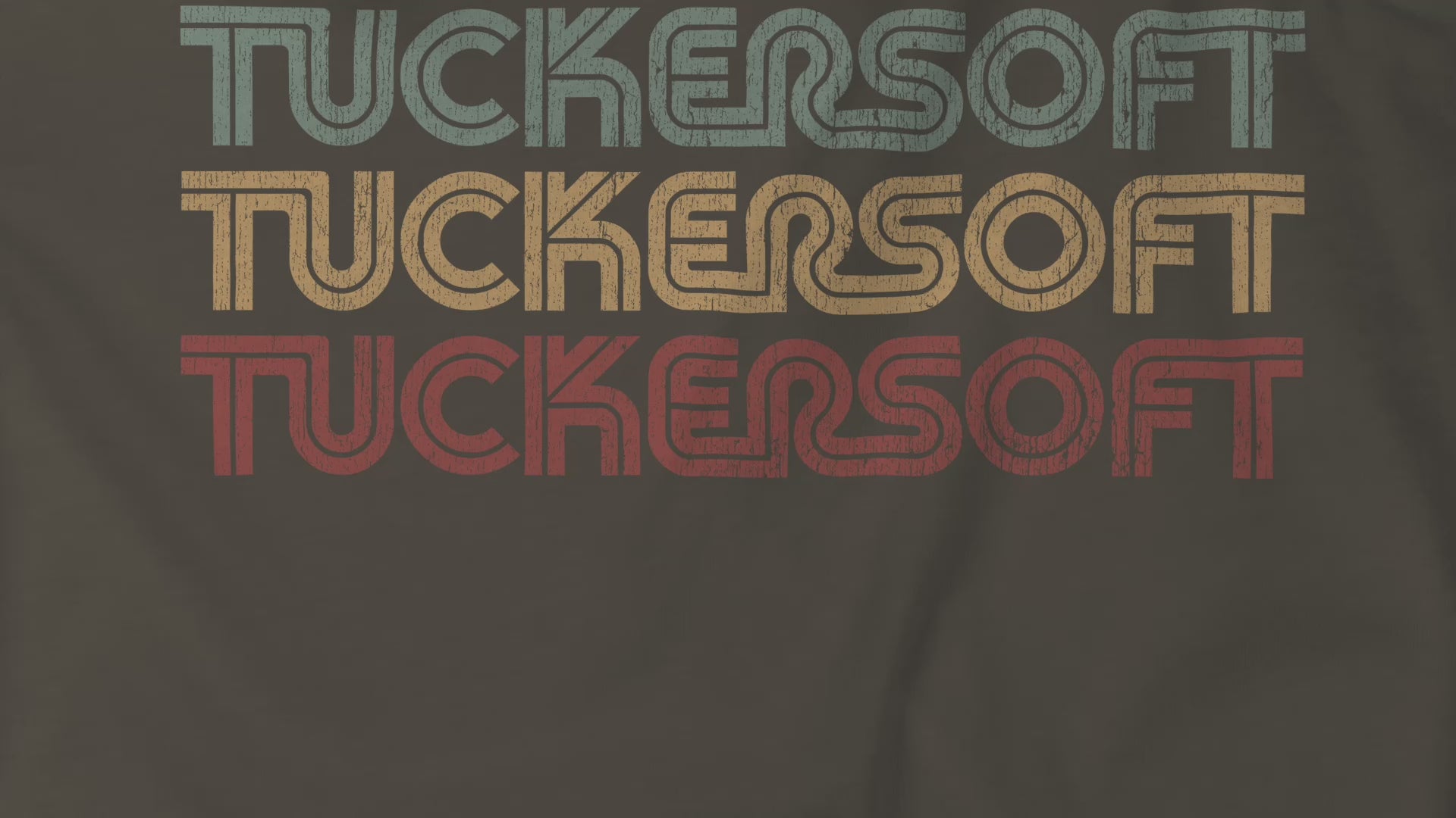 Video closeup of soft Bella+Canvas 3001 short-sleeve t-shirts and tees featuring a logo graphic of the 1980s fictional video game company Tuckersoft inspired by the TV show Black Mirror and the episode Bandersnatch in a vintage distressed style, sold by ScriptedBrand.