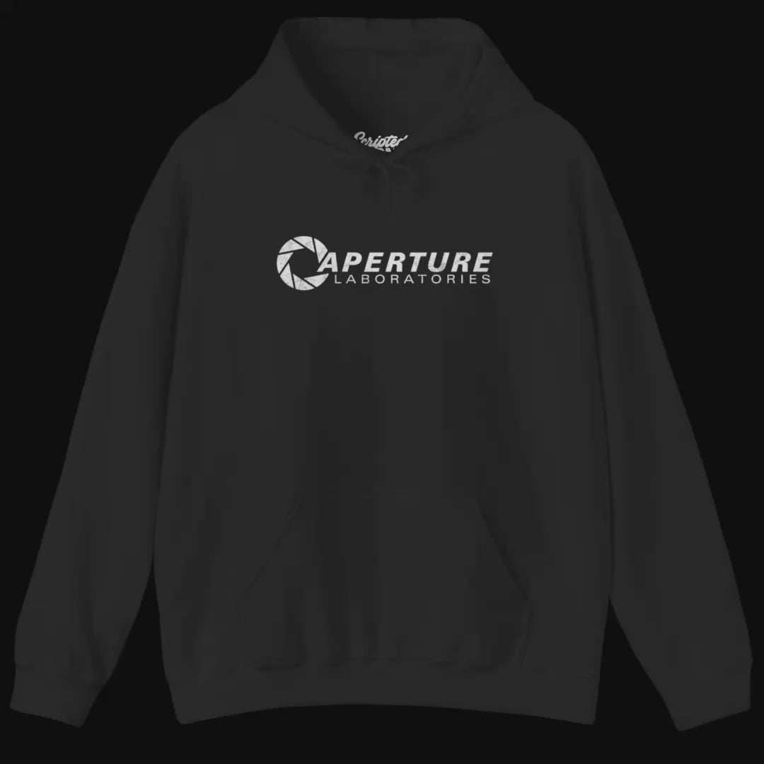 Video of soft Unisex Hoodie Heavy Blend Hooded Sweatshirts featuring the Aperture Laboratories logo from the video game Portal and Portal 2 in a vintage distressed style, sold by ScriptedBrand.