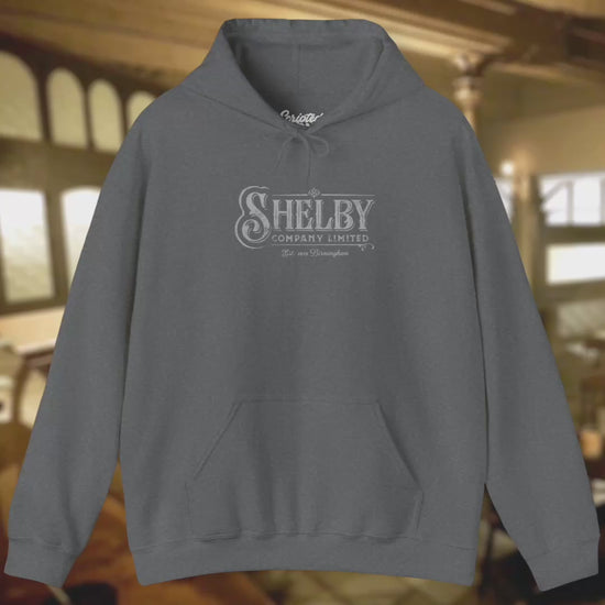 Video of a Soft Unisex Hoodie Heavy Blend Hooded Sweatshirt featuring the fictional logo Shelby Company Limited from the TV series Peaky Blinders in a vintage distressed style, sold by ScriptedBrand.