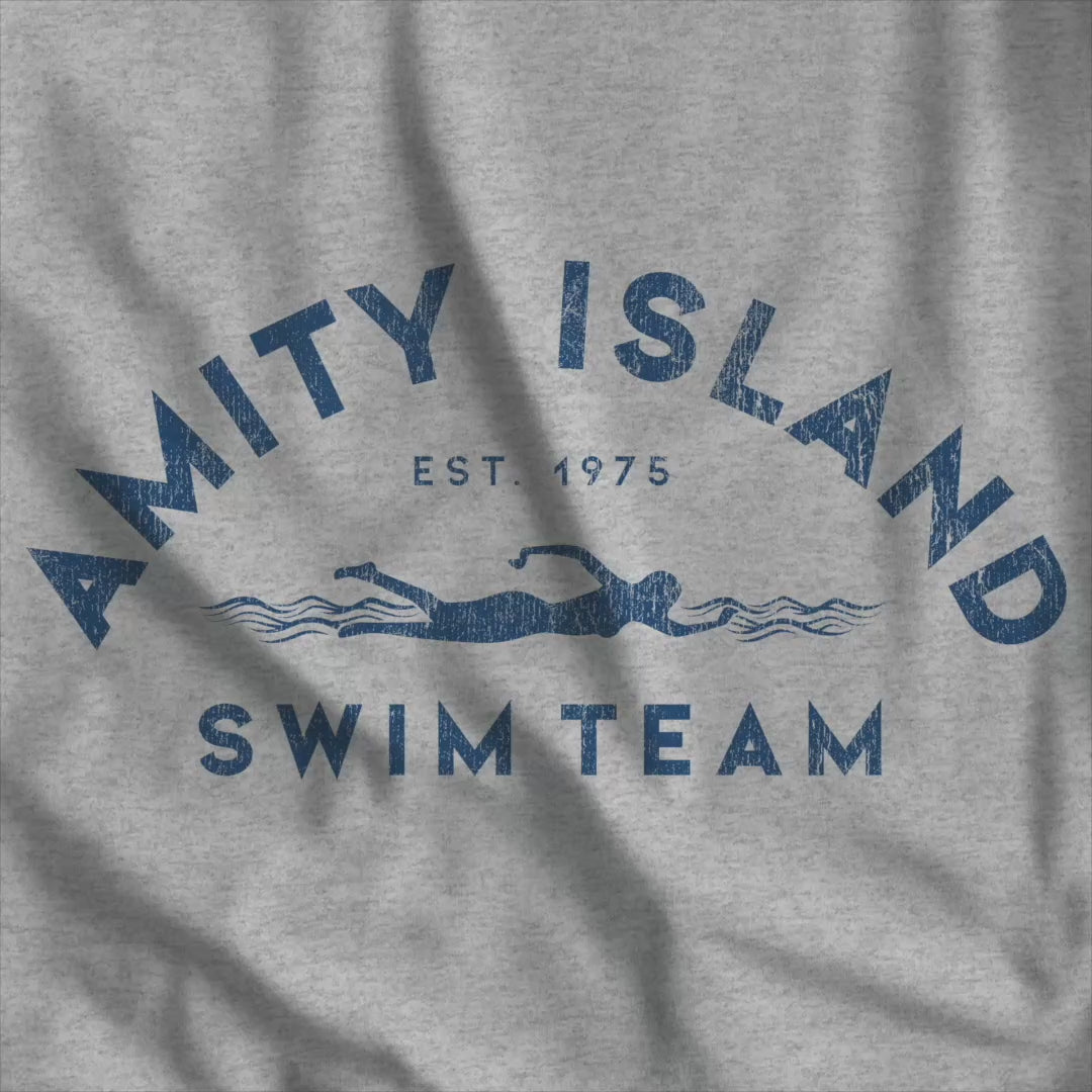 Video of tee with vintage distressed Amity Island Swim Team Jaws-inspired swimmer logo