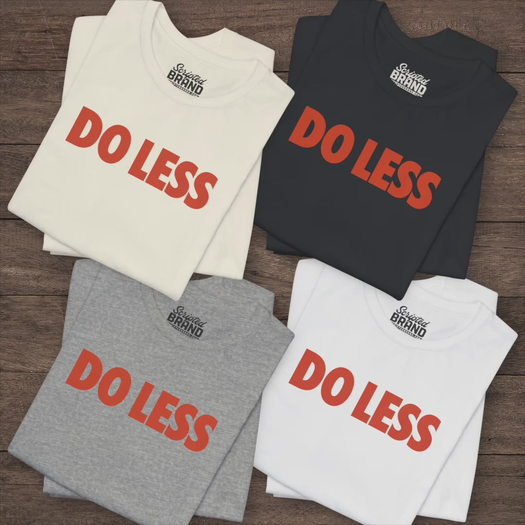 Video of 'Do Less' graphic t-shirts inspired by Shrinking TV show, Bella+Canvas cotton tee with orange type