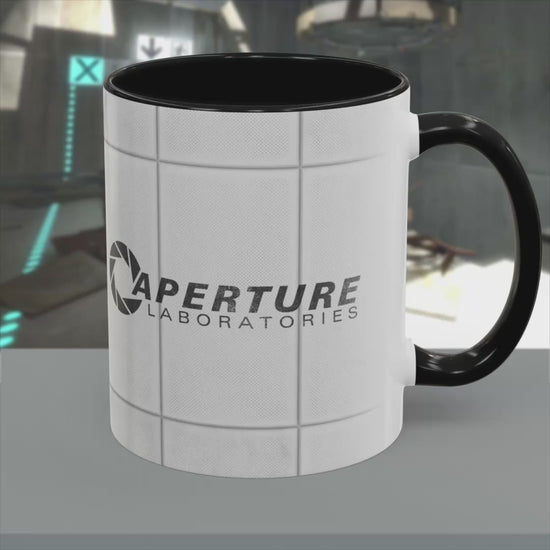 Video of mug with Aperture Laboratories logo, Portal test chamber panel wall wrap, logo printed both sides, on a table.