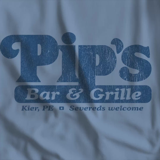 Video of Bella+Canvas t-shirt with the Pips Bar and Grill logo from the TV show Severance in a vintage distressed style.