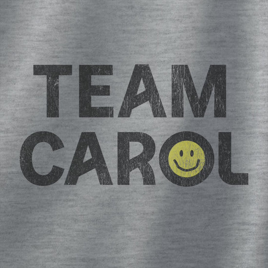 Video of unisex Heavy Blend pullover hoodie sweatshirt with TEAM CAROL vintage distressed smiley graphic