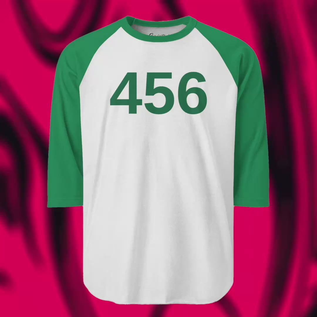 Video of a Green and White colored soft Tultex 245 Unisex Three-Quarter Sleeve Raglan Player T-Shirt featuring three custom numerals from the popular TV series Squid Game. The shirt can be personalized by the customer to include any three digits.
