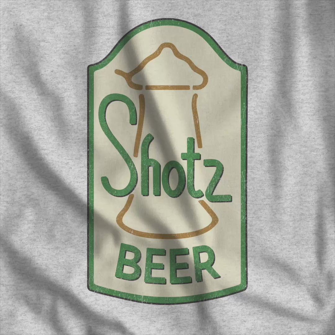 Video of Heather gray t-shirt with distressed Shotz Beer Brewery logo graphic, inspired by TV show Laverne & Shirley.